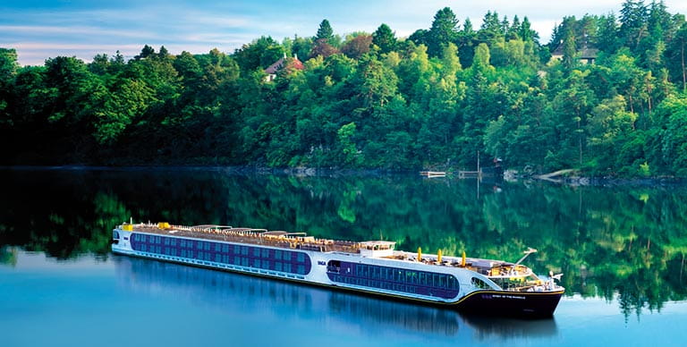 Spirit of the Moselle sailing beside a forest